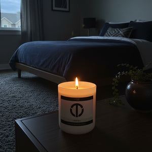 loft81 home desire candle burning in a modern bedroom at night non toxic hand poured coconut soy candle for calm ambiance and luxury home fragrance